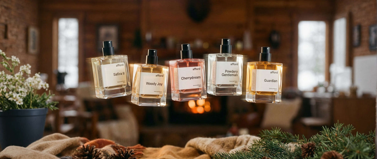 Afford-Parfums schweben vor einem Kamin in einer winterlichen Hütte