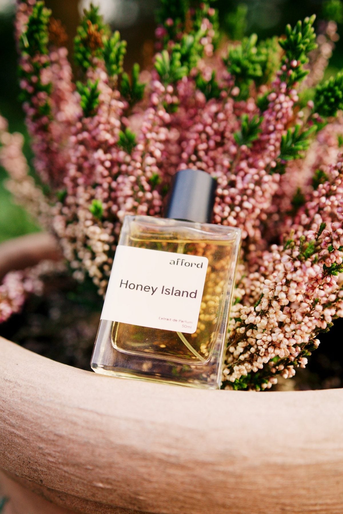 Afford-Flakon Honey Island im Heidekraut